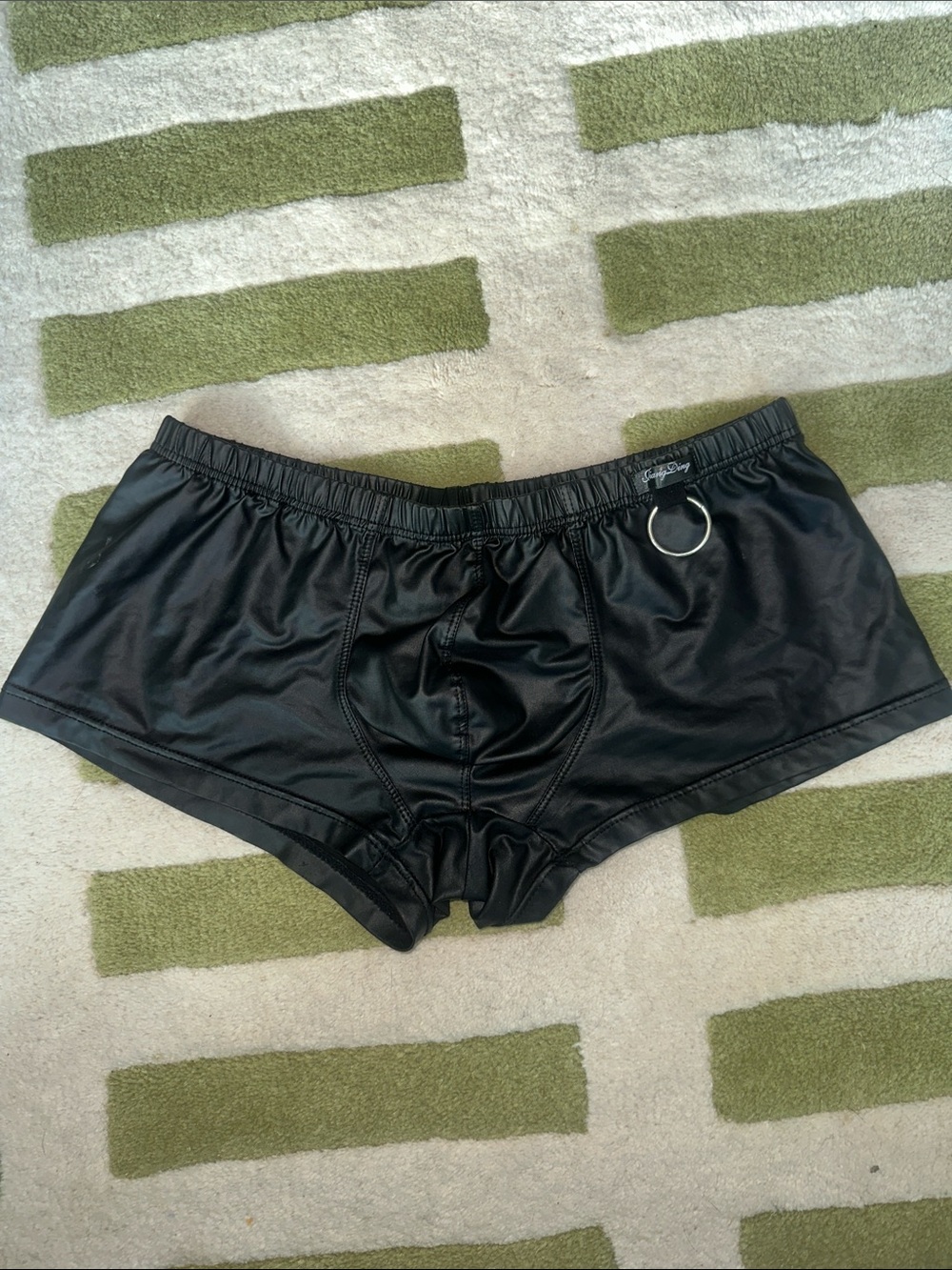 Faux Leather Shorts with Ring Accent